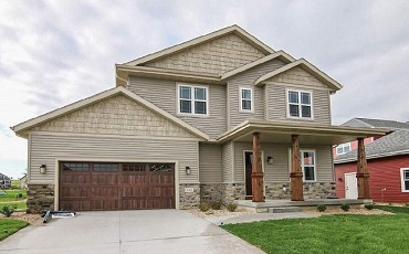 The front of a custom built home by Trademark Homes.